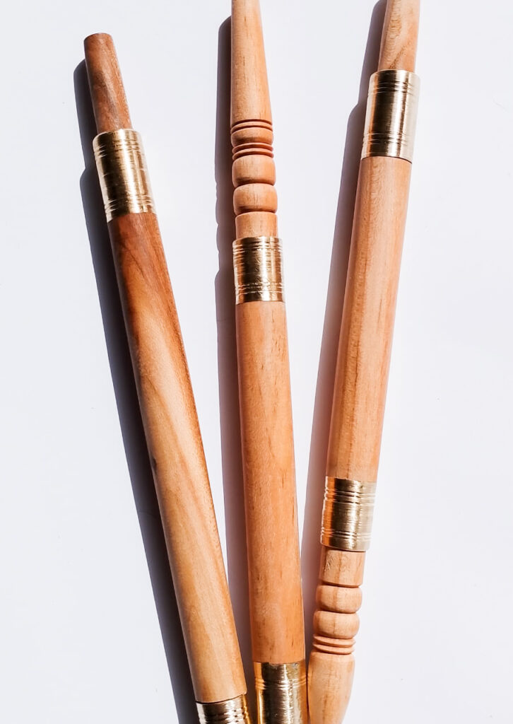 Three sebsi pipes in black, blond and honey wood with matching turning