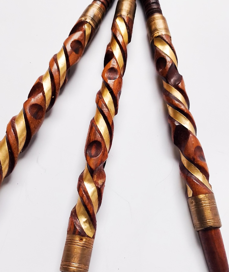 Hand-carved traditional Moroccan sebsi pipes arranged in a fan
