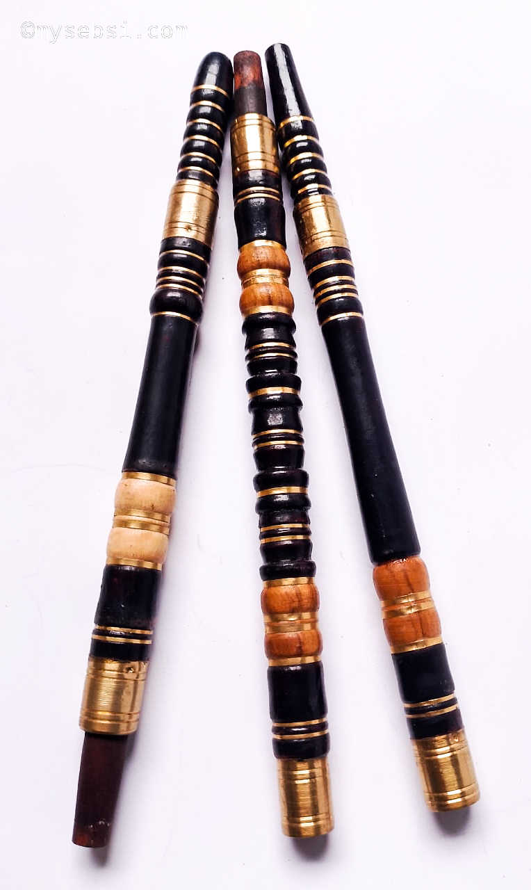 Black sebsi stems banded in ember orange and cream